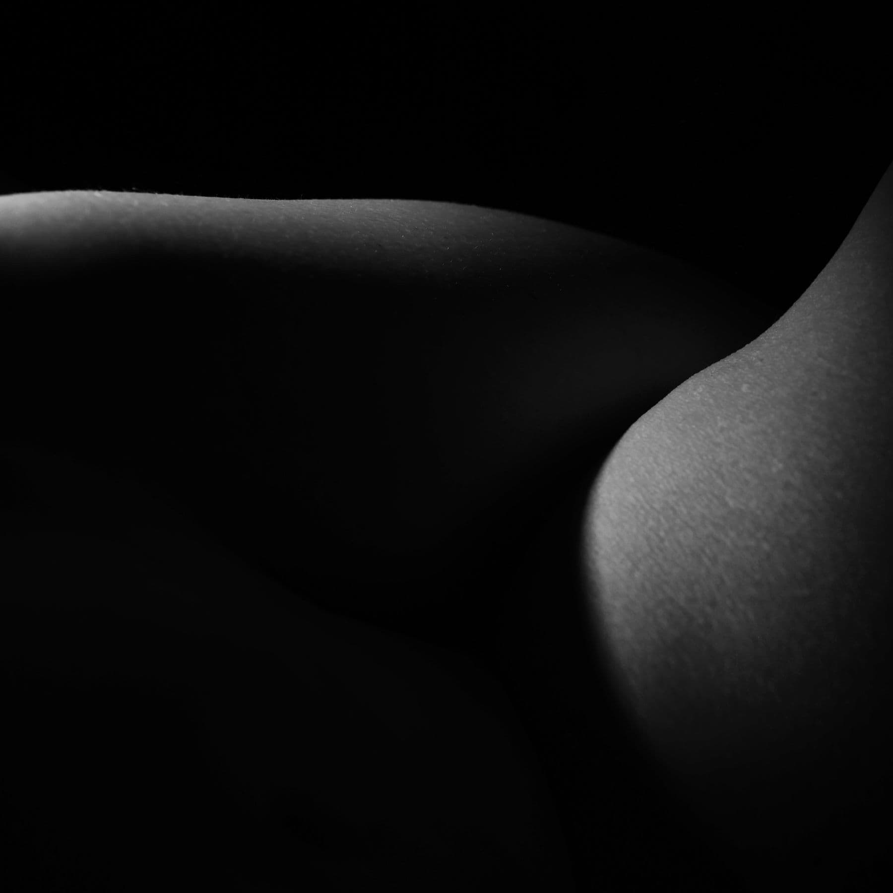 Skin's Secret Conversation — black and white photographic artwork by Nick Brand